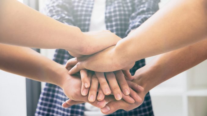 teamwork join hands support together concept